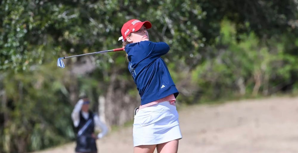 Junior Olivia Wilkie on the golf course. Courtesy of Richmond Athletics