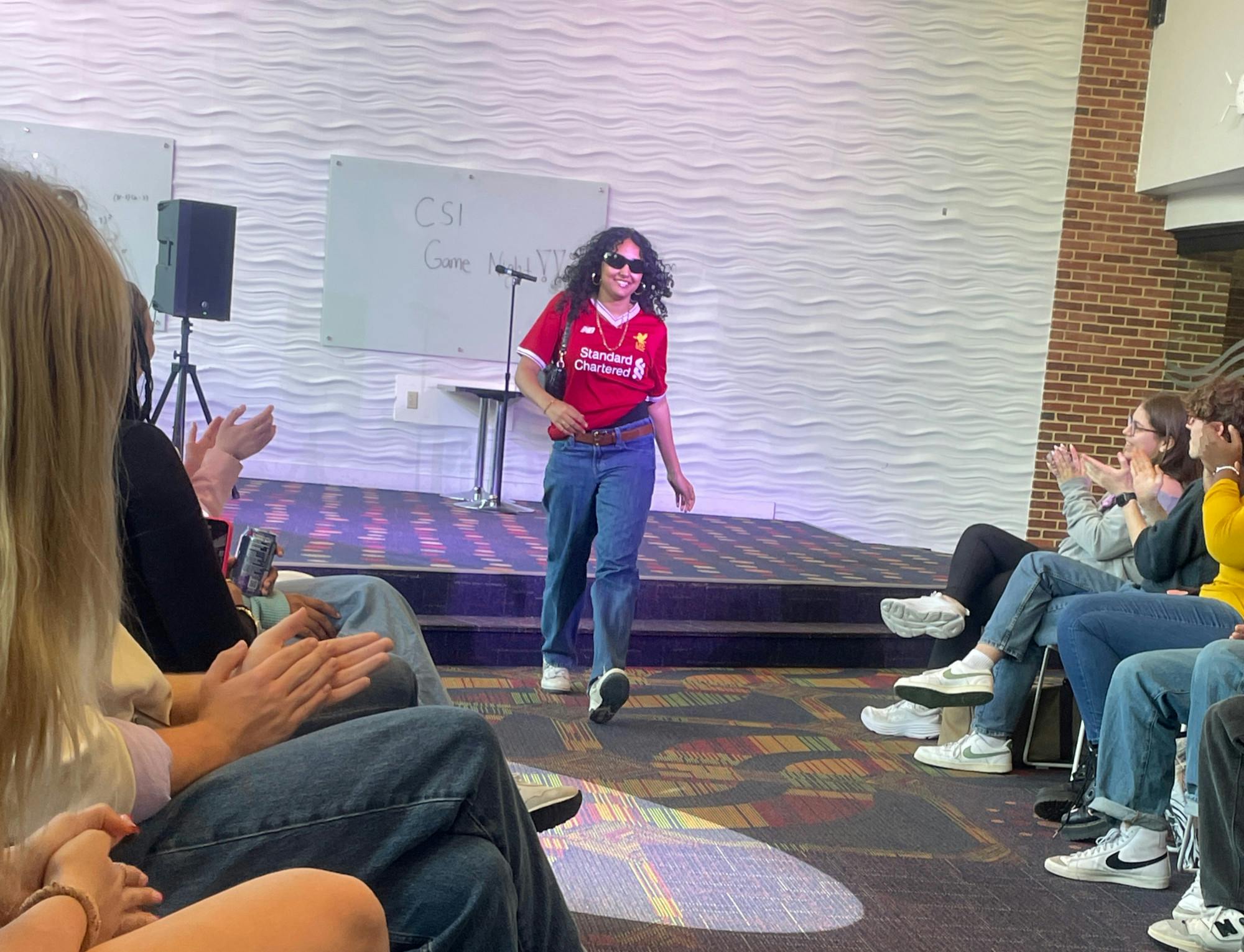 First-year Yasmeen Mukhtar walks down the runway during at UR Rethink Waste Second Hand Fashion Show.