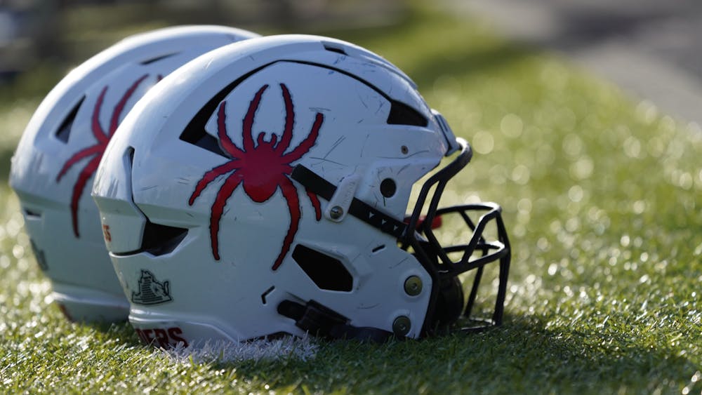 Richmond Spiders football helmets.