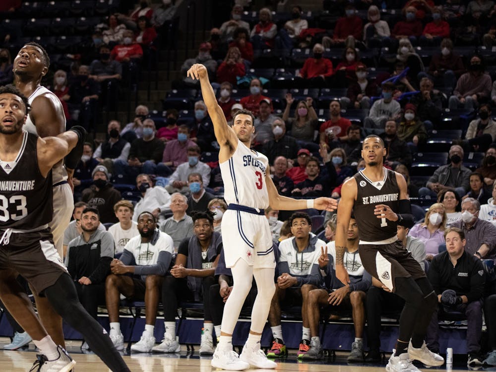 Junior Forward Tyler Burton goes for a three pointer in University of Richmond's game against St. Bonaventure on Feb 4.