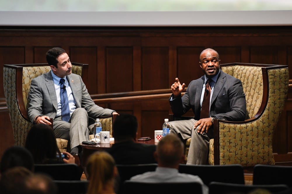DeMaurice Smith (right), executive director of the National Football League Players Association, spoke on Tuesday, Oct. 29, 2019 at the E. Claiborne Robins School of Business.&nbsp;