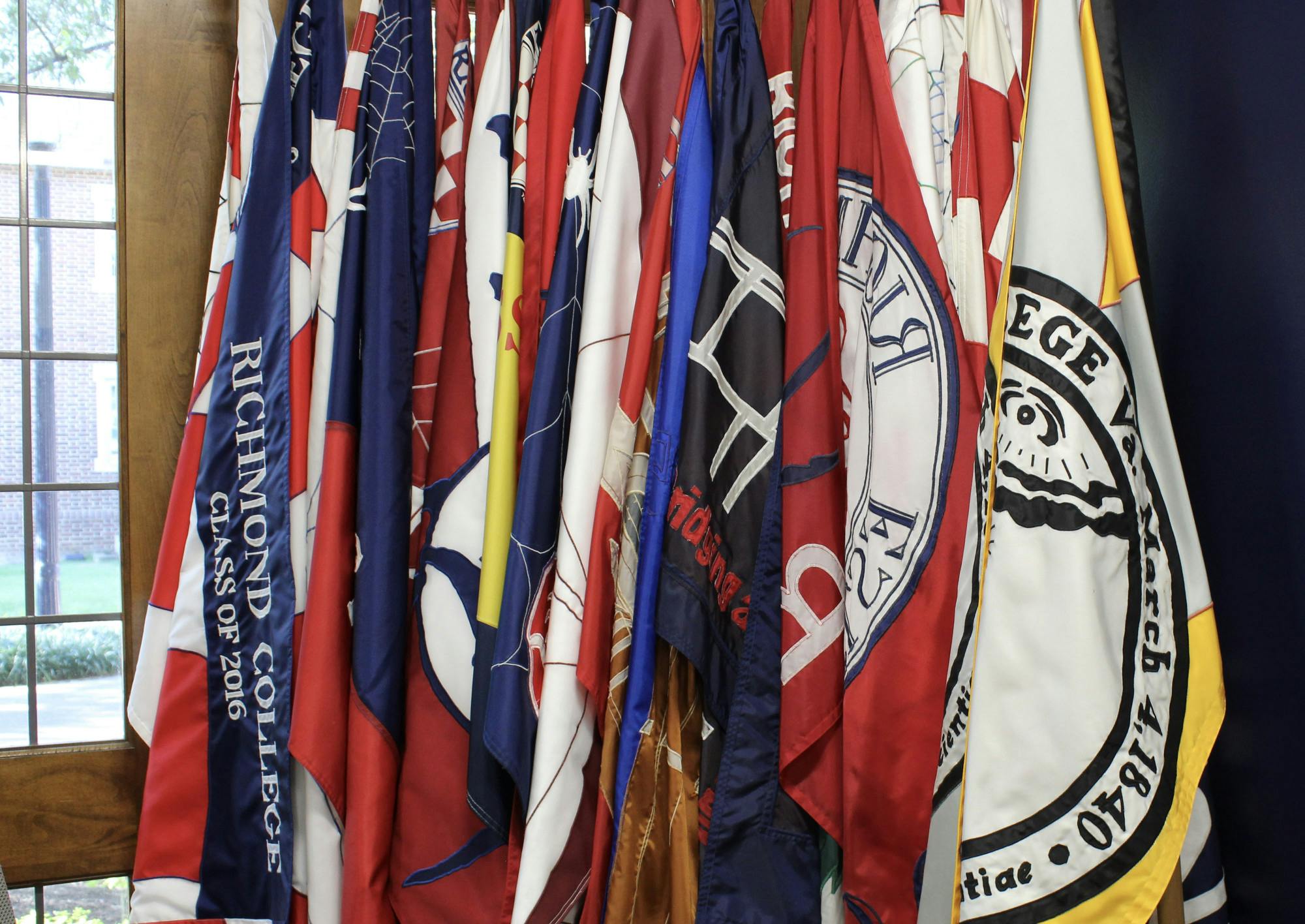 A set of flags representing different graduating classes of Richmond College. 