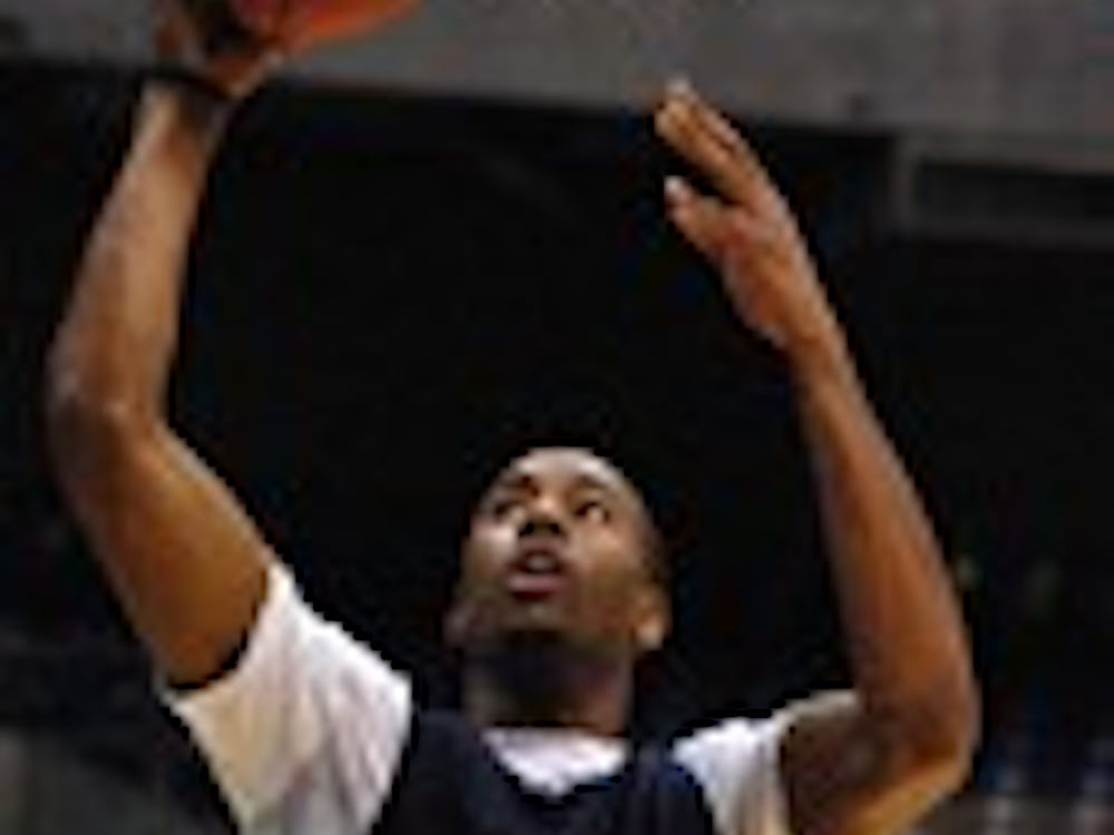 University of Richmond junior forward Darrius Garrett (1) goes up for a layup during a team practice at the Alamadome in San Antonio on Thursday, March 24, 2011, a day before the Spiders' game against No. 2 ranked University of Kansas. (Andrew Prezioso/The Collegian)