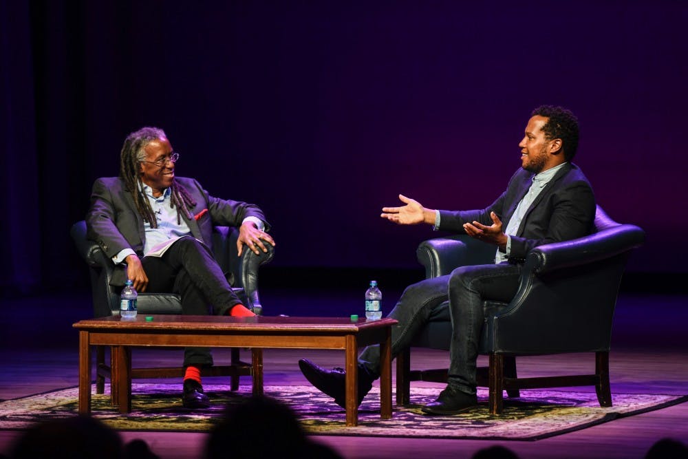 <p>Playwright Branden Jacob-Jenkins (right) discusses a range of topics during a discussion moderated by English Professor Bertram Ashe.&nbsp;</p>