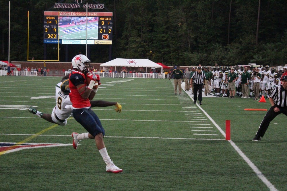 Tyler Wilkins secures a 32-yard pass for a touchdown at the end of the second quarter.&nbsp;