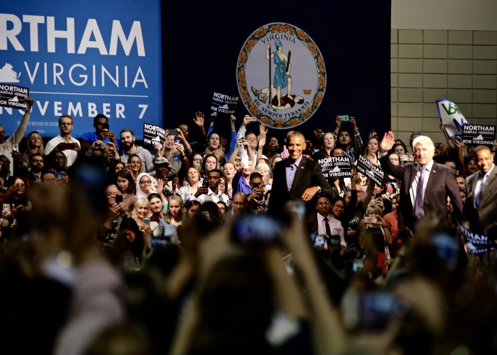 <p>A cheering crowd welcomes former President Barack Obama at the Richmond Convention Center during a rally for&nbsp;Ralph Northam, Democratic&nbsp;gubernatorial candidate.&nbsp;<em>Photo by Erin Moon.</em></p>