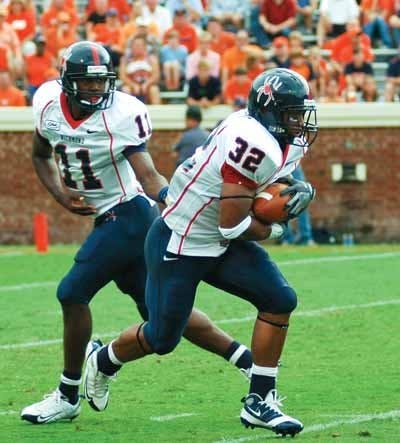 Tailback Josh Vaughan (32) and quarterback Eric Ward (11).