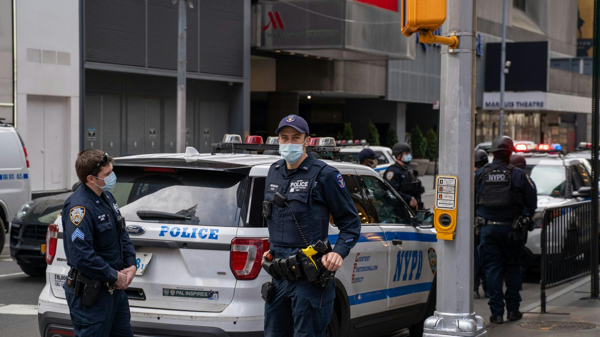 &nbsp;An NYPD officer covers his face while posted at Times Square on April 5, 2020.&nbsp;