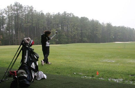 Annie Sprick, '11, practices at the golf team's facilities Tuesday afternoon.  The women's golf team is in Georgia this weekend for the CAA Championship.