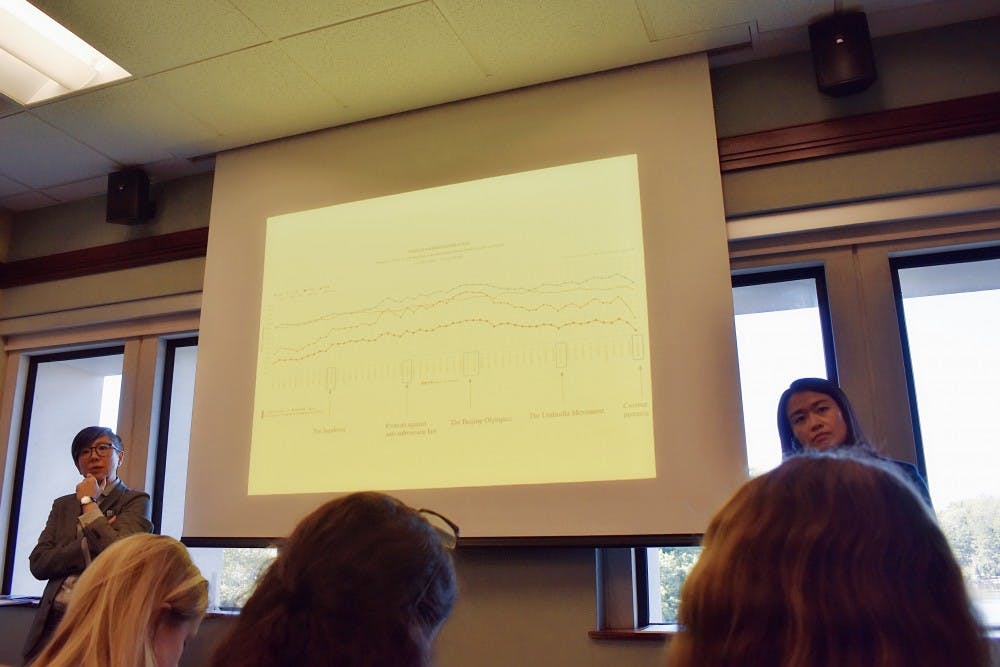 Professors Tze Loo and Dan Chen answer questions at the Protests in Hong Kong Teach-In.