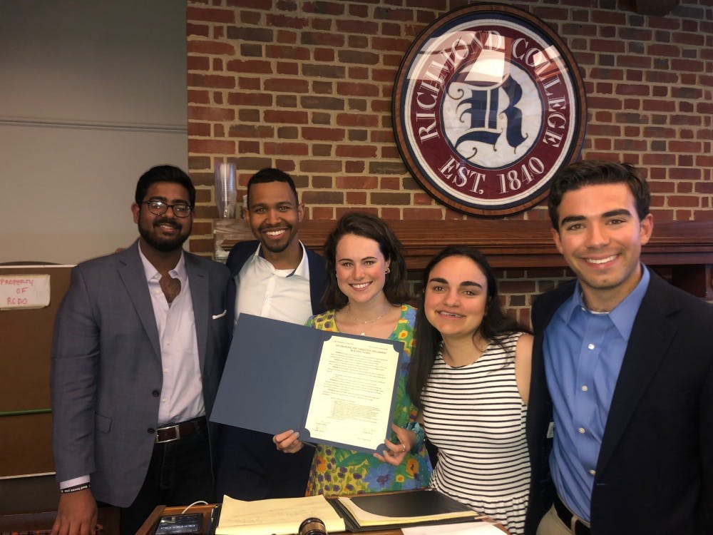 <p>The signing of the joint resolution with Senator Aquilla Maliyekkal (left), junior; RCSGA President Tyler York, senior; WCGA President Monica Stack, senior; Senator Caroline Schiavo, junior; and Senator AJ Polcari, sophomore. <em>Photo courtesy of Kevin Villagomez</em></p>