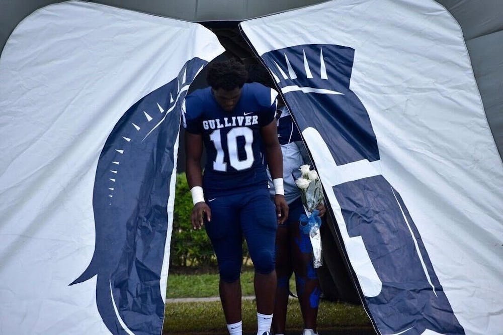 <p>University of Richmond wide receiver Ulises Sarria mourns the loss of his friend and former teammate D'Sean Perry, who was fatally shot at the University of Virginia on Nov. 13. Photo courtesy of Sarria.</p>