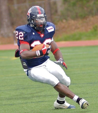 Tim Hightower rushes the ball in Saturday's Spring Football Scrimmage. Hightower had 11 rushes for 59 yds.