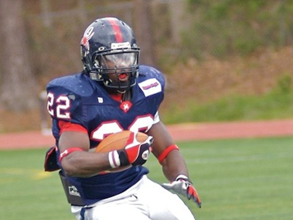 Tim Hightower rushes the ball in Saturday's Spring Football Scrimmage. Hightower had 11 rushes for 59 yds.
