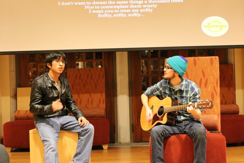 <p>Students perform at the International Month closing ceremony in the Weinstein International Center.</p>