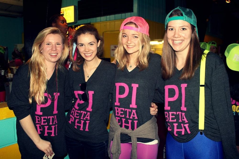 <p>Current USAID appointee Merritt Corrigan, second from left, seen with other members of the Virginia Eta chapter of Pi Beta Phi in 2013 during her time at UR.<em>&nbsp;</em></p>