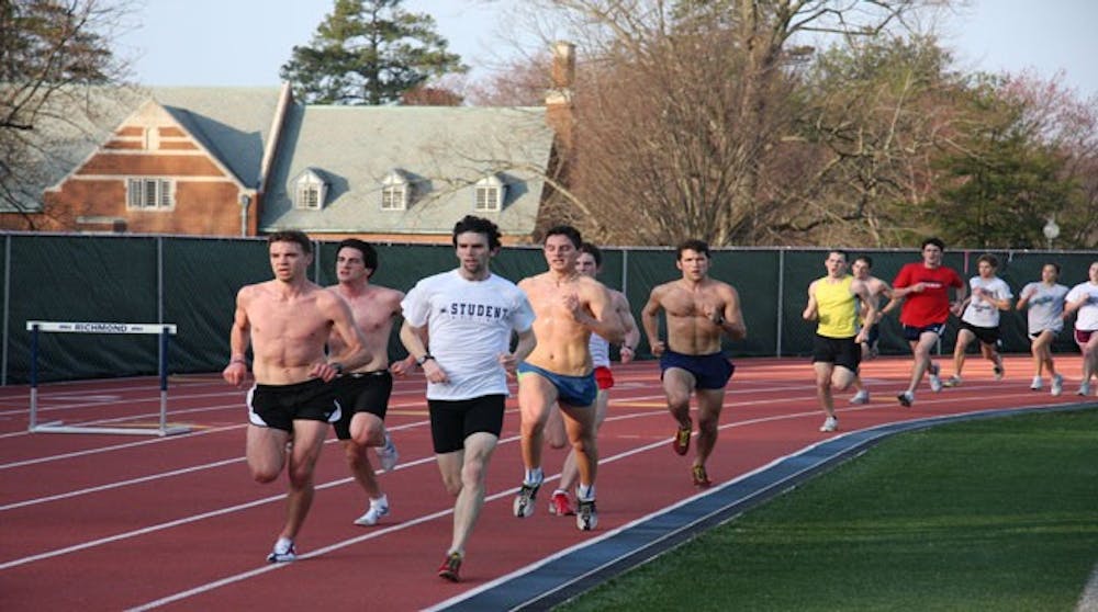 Members of the men's track team with Jeff Strojny, '09 and Sean Welsh, '09 in the lead