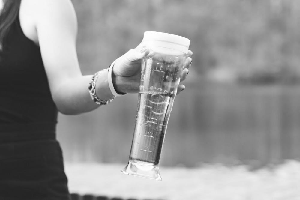 SwigSafe, pictured above, is a pilsner-shaped bottle that has a spill and tamper-resistant lid as well as measurements on the bottle to show the user how much they are drinking.