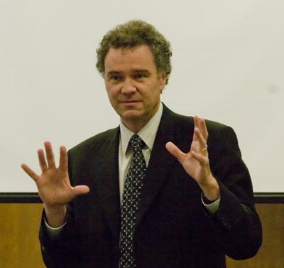 Dr. Ayers speaks at the strategic planning meeting.