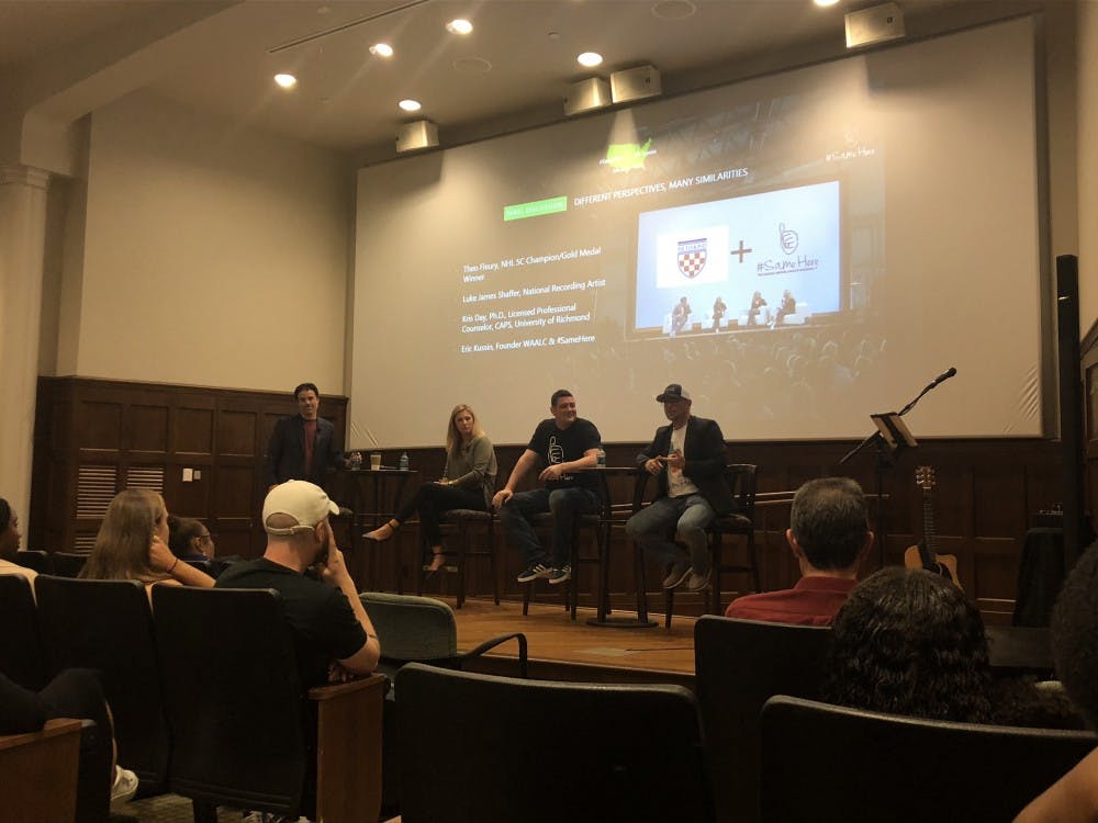 <p>From left, Darren Rovell, Dr. Kristen Day, Eric Kussin and Theo Fleury participated in the "We're All a Little Crazy" discussion on mental health Tuesday in Ukrop Auditorium.&nbsp;</p>