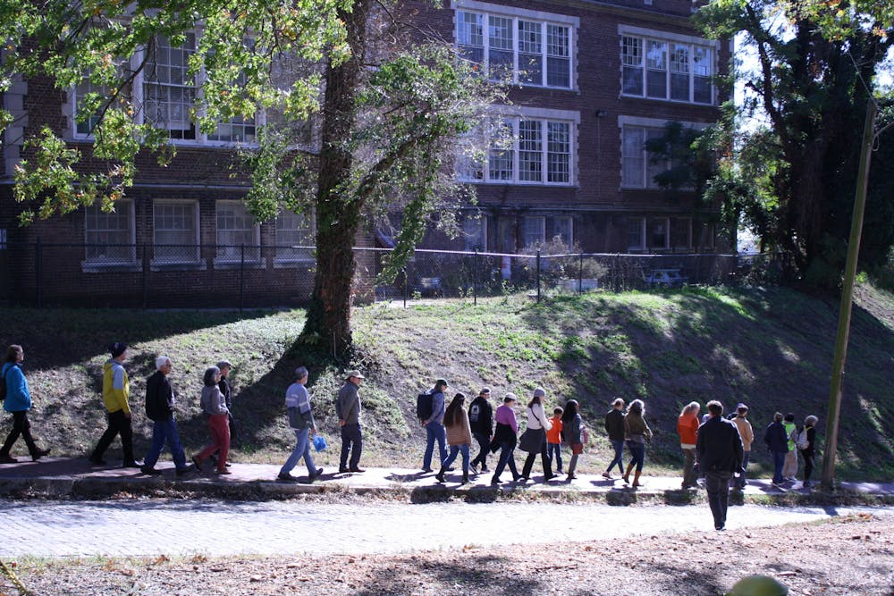 Dharma practitioners from across the state depart from Richmond Hill for the State Capitol.