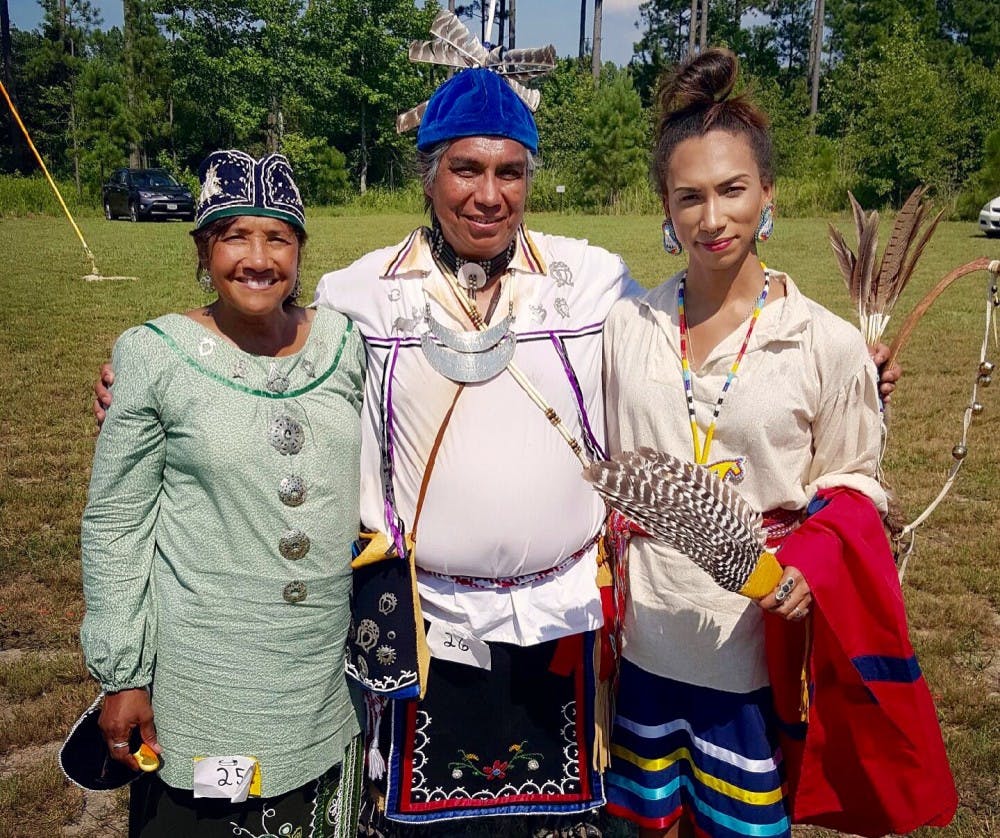 <p>Young Brinson (right), a 2015 Richmond graduate and member of the&nbsp;Cheroenhaka Nottoway tribe of Virginia, stands with members of the Nottoway's sister tribes.&nbsp;</p><p>Photo courtesy of Young Brinson</p>