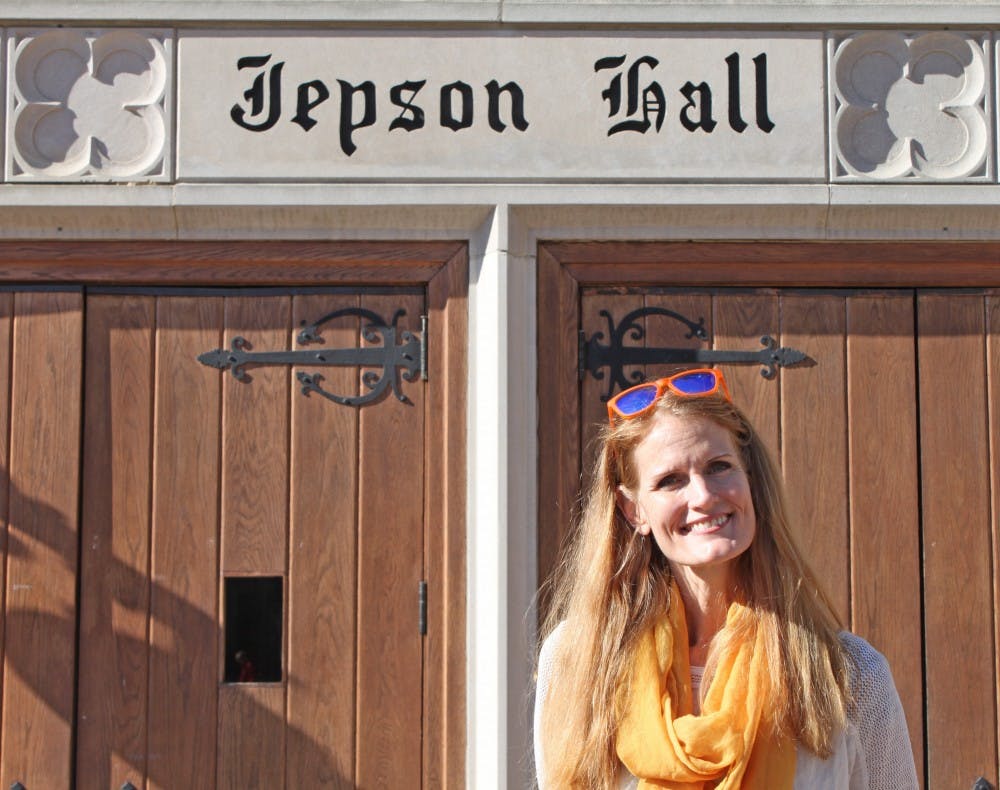 <p>Crystal Hoyt stands in front of Jepson School of Leadership Studies.</p>