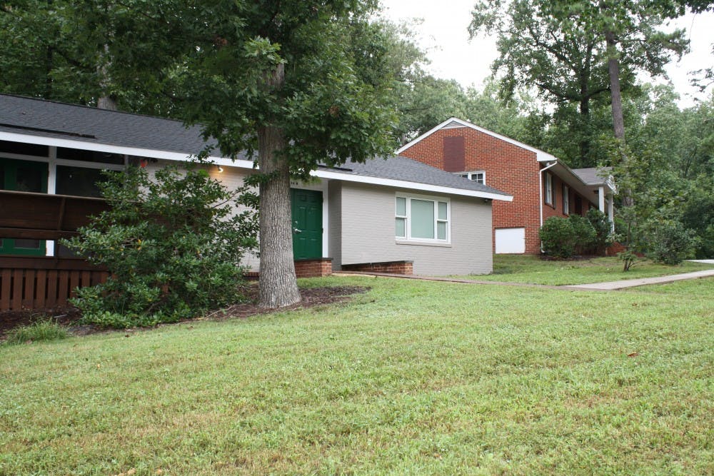 Two fraternity lodges on New Fraternity Row.