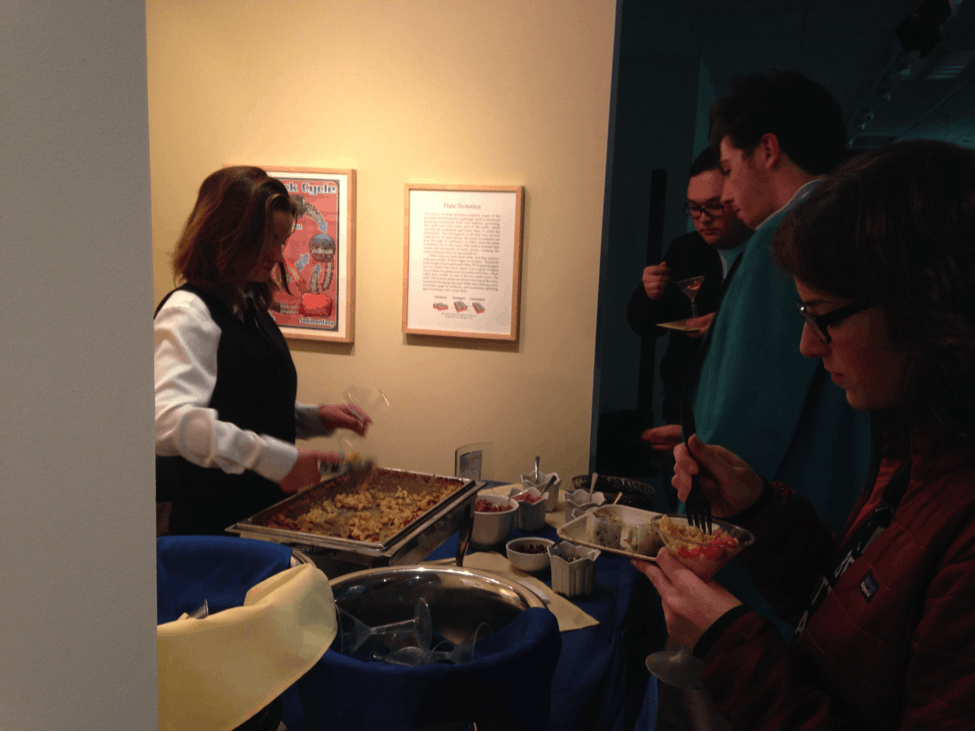 Students gather around the&nbsp;macaroni and cheese bar.