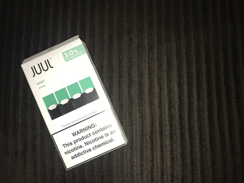 A carton of mint-flavored Juul pods.