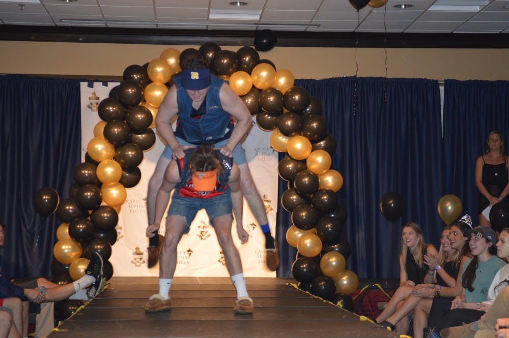 On Tuesday, Kappa Alpha Theta hosted KATwalk, its annual philanthropy that supports the sorority's national philanthropy, Court Appointed Special Advocates, which aids volunteers in their help for neglected or abused children that go through the court system. KATwalk is a runway event where local stores donate clothes for the models to wear and sell. During the second part of the night, various organizations get up on stage to give their take of what a runway appearance should look like. The teams are judged by Richmond faculty. Gallery by Moira Lachance.