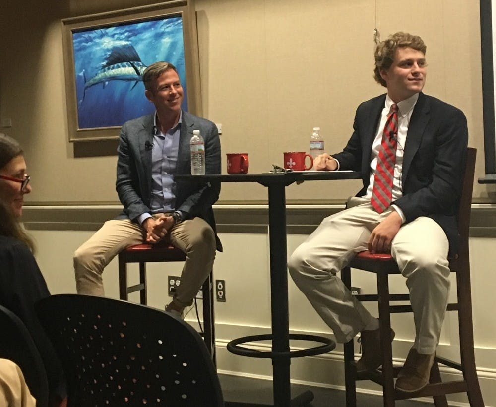 Peter Hamby, left, talks with St. Christopher's alum Will Bird, right, in a Q&amp;A style discussion about politics and social media.
