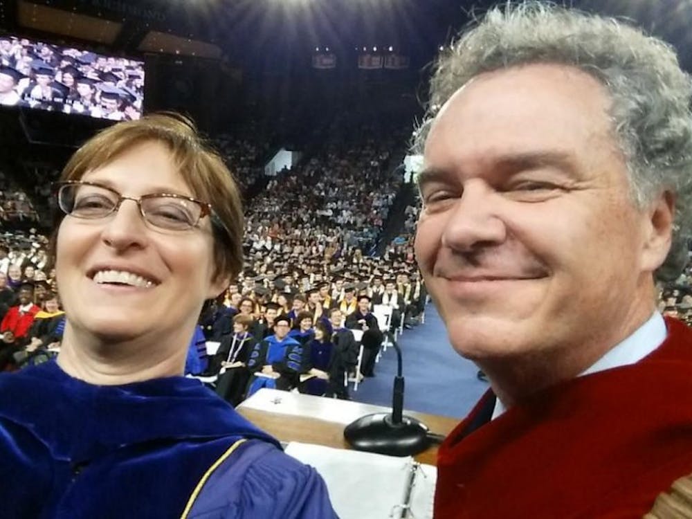 Provost Jacquelyn Fetrow and former President Edward Ayers take a selfie at 2015 commencement. Photo courtesy of University of Richmond website.