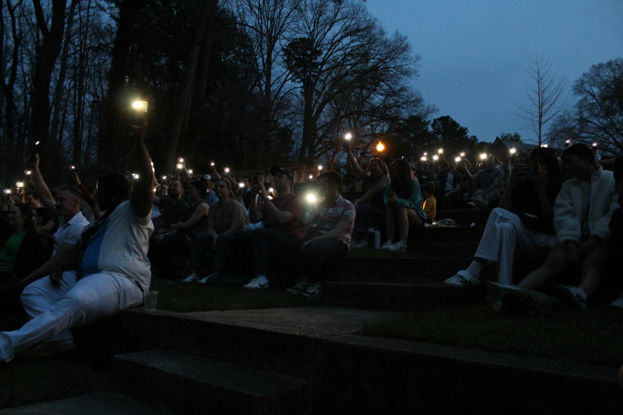 Concertgoers lit up the Greek Theater with cell phone lights.
