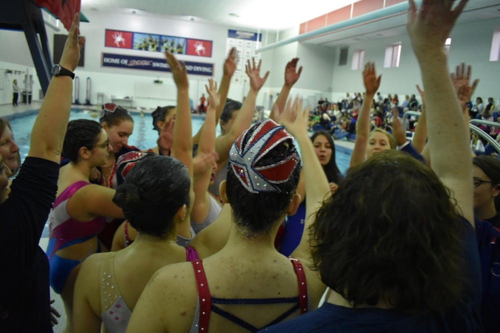 <p>Both the current members and alumni of the synchronized swimming team&nbsp;came together&nbsp;before the competition to do the Spider cheer. Photo courtesy of coach Asha Bandal.&nbsp;</p>