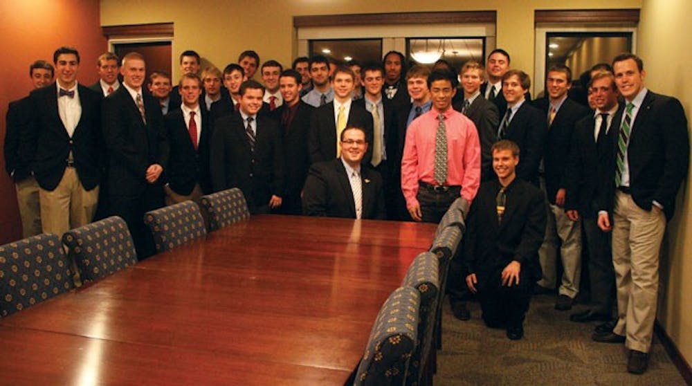 The 31 associate members of Lambda Chi Alpha, seen here with national representatives Matt Schultz and Patrick Voldness, accepted bids during a ceremony Sunday night in the Tyler Haynes Commons.