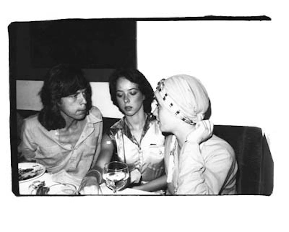 Andy Warhol (American, 1928-1987), Mick Jagger, Mackenzie Phillips, and Nicky Lane Weymouth, circa 1970-1987, silver gelatin print, 8 x 10 inches, Joel and Lila Harnett Print Study Center, University of Richmond Museums, Gift of The Andy Warhol Foundation for the Visual Arts, Inc., The Andy Warhol Photographic Legacy Program. H2008.13.132. 