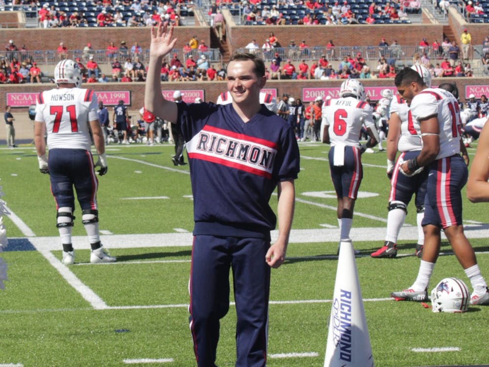 <p>Cheerleader Craig Caudill at the football game on Sept. 24th during Family Weekend. &nbsp;</p>