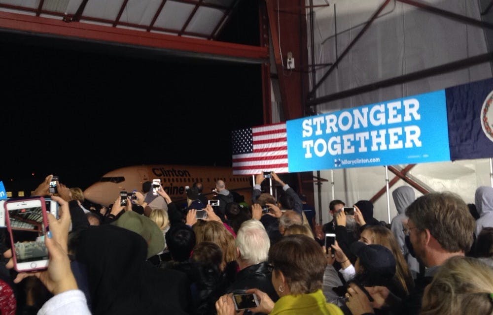 Tim Kaine's plane taxis to the hanger where hundreds of supporters wait to hear him speak.