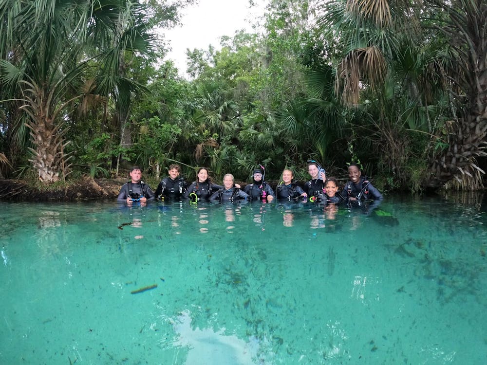 <p>Sophomore Emily Lekas (third from the right) at a scuba diving trip to Raibow River in Dunellon, Florida. Photo Courtesy of Lekas.&nbsp;</p>
