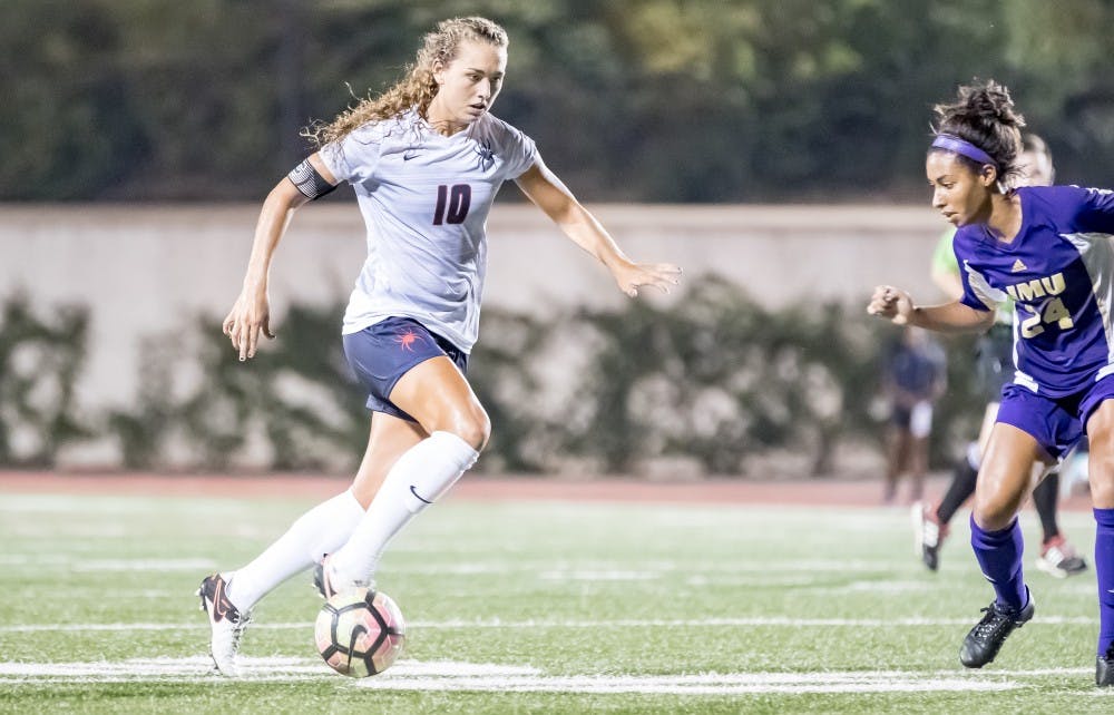 <p>Richmond soccer star Lexi Prillaman dribbles the ball at Robins Stadium against James Madison.&nbsp;</p>