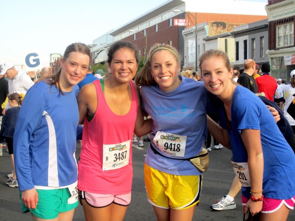 Juniors, Helen Yanta, Micala MacRae, Alexa Gruber, and Maddie Cleland ready to participant in the annual Monument 10k