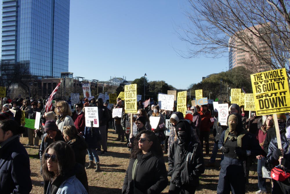 <p>Protesters listening to speakers at walkout on Jan. 20.&nbsp;</p>