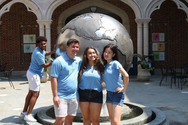WOW interns pose in the Carole Weinstein International Center. Photo courtesy of the Welcome to our Web page on Presence.