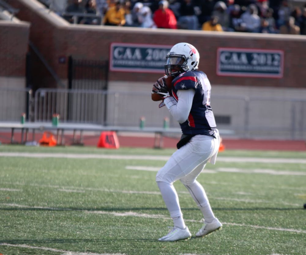 <p>Quarterback Kevin Johnson led the Spiders to a playoff win in his first career start on Saturday.&nbsp;</p>