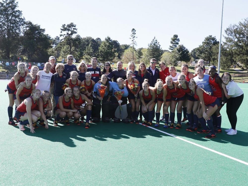 The University of Richmond field hockey team celebrates their senior day after a 2-0 win over Davidson on October 19th. Photo courtesy of Spider Field Hockey Instagram. 