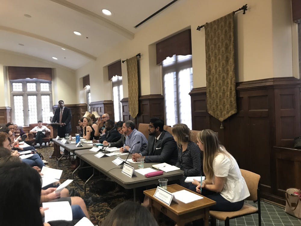 Henry Chambers Jr., professor of law, moderates the 10-person panel at Got Voice? in the Brown Alley room on Feb. 5. &nbsp;