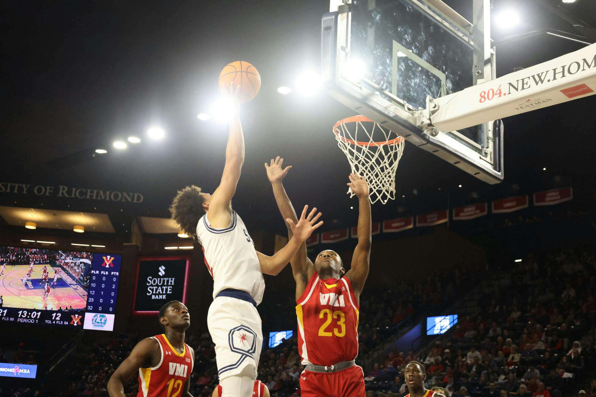 Graduate Guard Jordan King jumps up to take a shot during game against VMI at the first men's basketball game of the season Nov. 6.&nbsp;