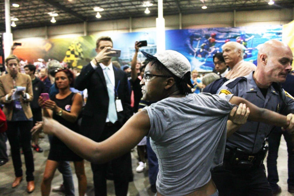 Donald Trump held a rally Wednesday at the Richmond International Raceway. According to Politico, "Black Lives Matter and pro-illegal alien Latino activists were forcibly removed" by police. Photos by Kayla Solsbak.