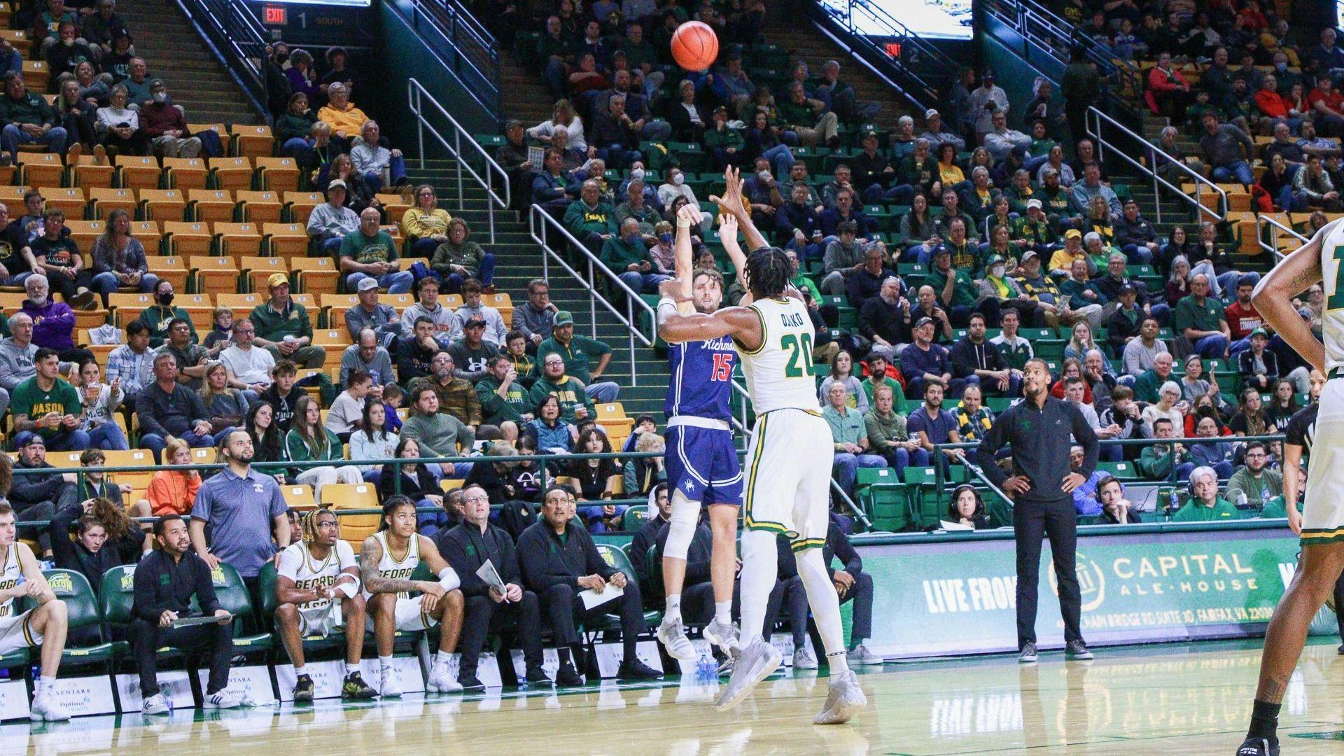 Graduate student Matt Grace shoots a three-pointer during the away game against George Mason on Dec. 31. Photo courtesy of Richmond Athletics.&nbsp;